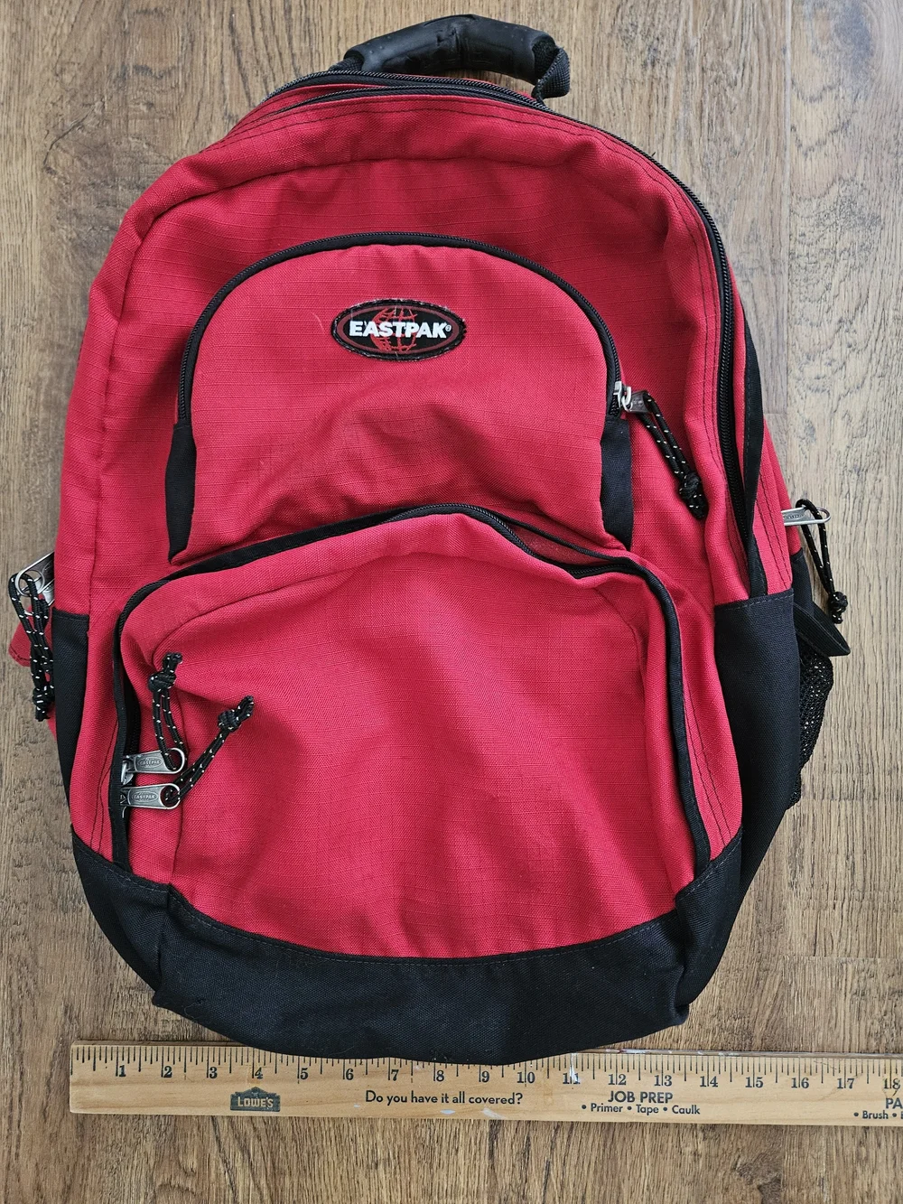 Eastpak Red and Black Backpack with Multiple Compartments
